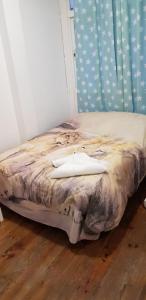 A bed or beds in a room at M&F Apartments Sol