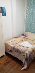 A bed or beds in a room at M&F Apartments Sol