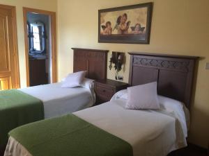 Postel nebo postele na pokoji v ubytování Finca Galea