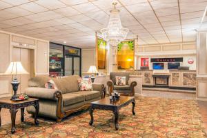 The lobby or reception area at Ramada by Wyndham Paintsville Hotel & Conference Center