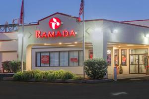 a ramadi store with a sign on the side of it at Ramada by Wyndham Yonkers - Westchester in Yonkers