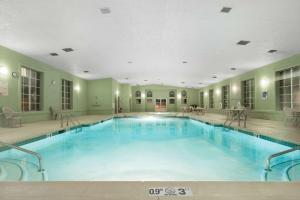 a large indoor swimming pool in a building at Ramada by Wyndham Williams/Grand Canyon Area in Williams