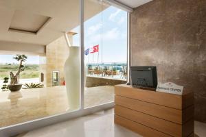 A television and/or entertainment centre at Ramada Resort Side
