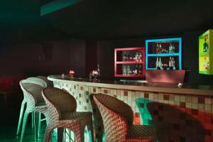 The lounge or bar area at Ramada Resort Side