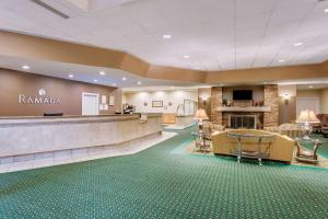 a lobby of a hotel with a hair salon at Ramada by Wyndham Provo in Provo