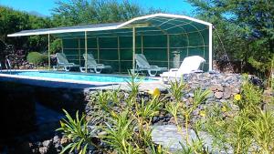 Bazén v ubytování Coin de Paradis,Pavillon Doucimar nebo v jeho okolí