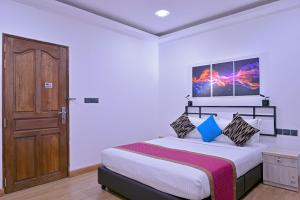 Katil atau katil-katil dalam bilik di Asaa View Maldives