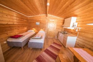 Cama o camas de una habitación en Rajamaa In Lapland