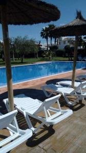 Bazén v ubytování Hostal Al-Andalus nebo v jeho okolí