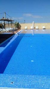 Bazén v ubytování Hostal Al-Andalus nebo v jeho okolí
