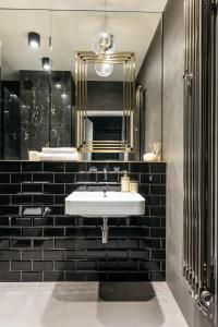 Kúpeľňa v ubytovaní Harmonica Apartment - LoftAffair