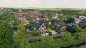 an overhead view of a residential neighborhood with houses at Kluiskade 24 Maasland in Maasland