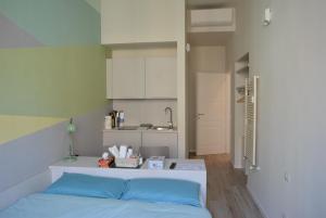 A kitchen or kitchenette at Aria di Casa - Navigli Darsena