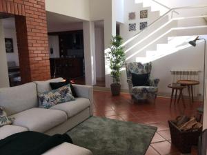 Uma área de estar em Villa Coloane - Family Vacation House