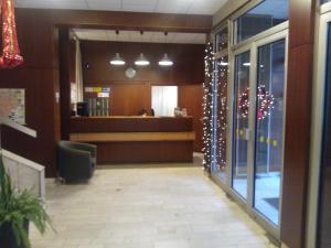 a lobby with a waiting area with christmas lights at Mary-Ann Non-Stop Apartments in Budapest