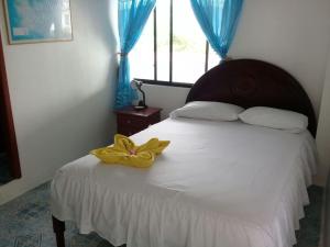 Voodi või voodid majutusasutuse Hostal Insular toas