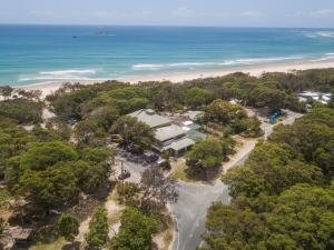 an aerial view of a house and the beach at Manta Lodge YHA & Scuba Centre in Point Lookout