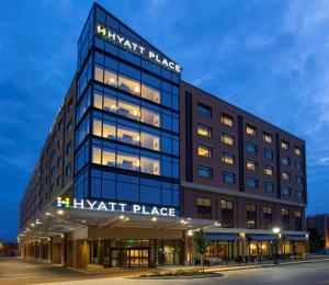 an office building with a knight place sign on it at Hyatt Place Bloomington Indiana in Bloomington