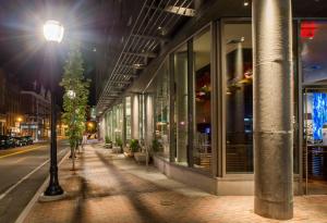 
a city street at night with a light on at Hyatt Place Portland-Old Port in Portland
