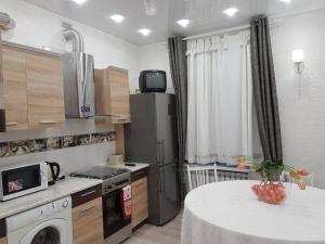 Η κουζίνα ή μικρή κουζίνα στο Luxurious apartments at Soborna St