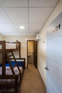 Llit o llits en una habitació de Airport Inn Managua