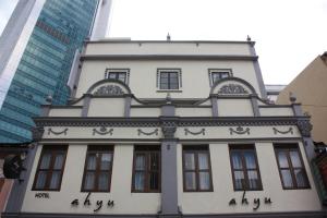 a building in the middle of a city at Ahyu Hotel in Kuala Lumpur