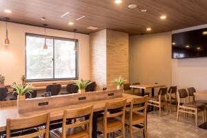 TV a/nebo společenská místnost v ubytování Hotel cooju Fukui