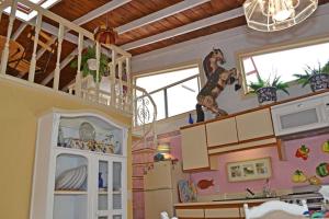 a room with a kitchen with a refrigerator at Amazingly Romantic Vacation for Your Honeymoon in Tijuana