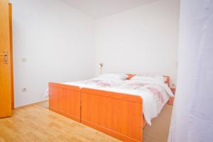 Ein Bett oder Betten in einem Zimmer der Unterkunft Holiday Home Vinac