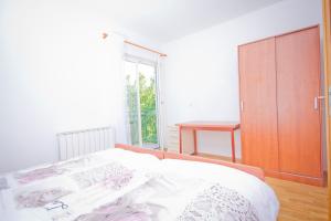 Ein Bett oder Betten in einem Zimmer der Unterkunft Holiday Home Vinac