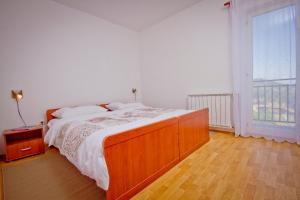 Ein Bett oder Betten in einem Zimmer der Unterkunft Holiday Home Vinac
