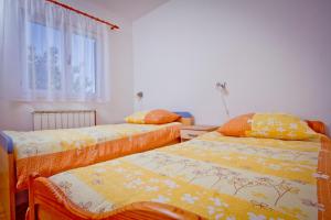 Ein Bett oder Betten in einem Zimmer der Unterkunft Holiday Home Vinac