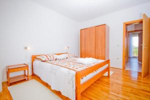 Ein Bett oder Betten in einem Zimmer der Unterkunft Holiday Home Vinac