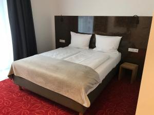 Posteľ alebo postele v izbe v ubytovaní Bed & Rooms, Wörgl