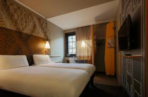 Postel nebo postele na pokoji v ubytování ibis Hotel Brussels off Grand'Place