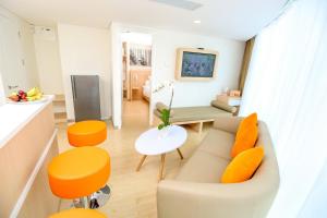 Predel za sedenje v nastanitvi HARRIS Hotel Sentraland