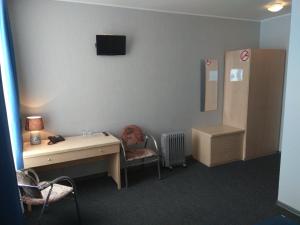 TV/trung tâm giải trí tại Alex Hotel
