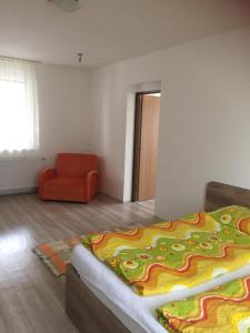 Postel nebo postele na pokoji v ubytování Promenád apartmány