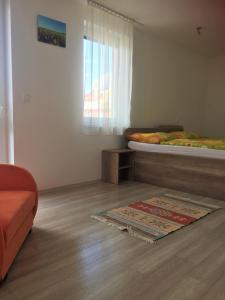 Postel nebo postele na pokoji v ubytování Promenád apartmány