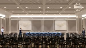 セインツ・コンスタンティン＆ヘレナにあるAstor Garden Hotelの中央に椅子とテーブルが備わる部屋
