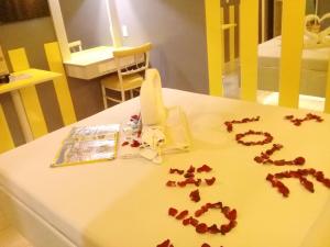 Postel nebo postele na pokoji v ubytování Hotel 99 Monumento