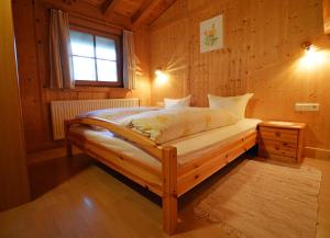 Postel nebo postele na pokoji v ubytování Chalet Astrid