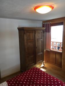 Postel nebo postele na pokoji v ubytování B&B Gressoney