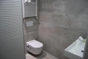 Kúpeľňa v ubytovaní Smart Tech Plaza Flat + 8 fotografií