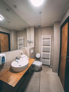 Koupelna v ubytování Orange Hotel + 37 fotografií