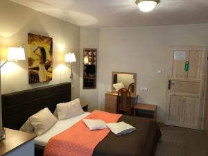 Кровать или кровати в номере Hotel Passione