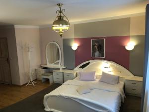 Postel nebo postele na pokoji v ubytování Hotel Passione