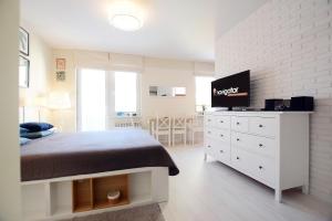 Kuchyňa alebo kuchynka v ubytovaní Apartamenty NAVIGATOR-PORT