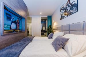 Posteľ alebo postele v izbe v ubytovaní Zigzak Apartments Superior 10B