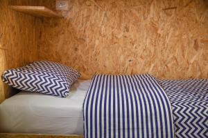 Postel nebo postele na pokoji v ubytování Buff Hostel Tirana
